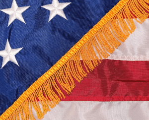American flag with gold fringe designed for ceremonial and indoor display American flag with gold fringe designed for ceremonial and indoor display